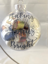 Load image into Gallery viewer, Baking Spirits Bright Upcycled Cookbook Ornament